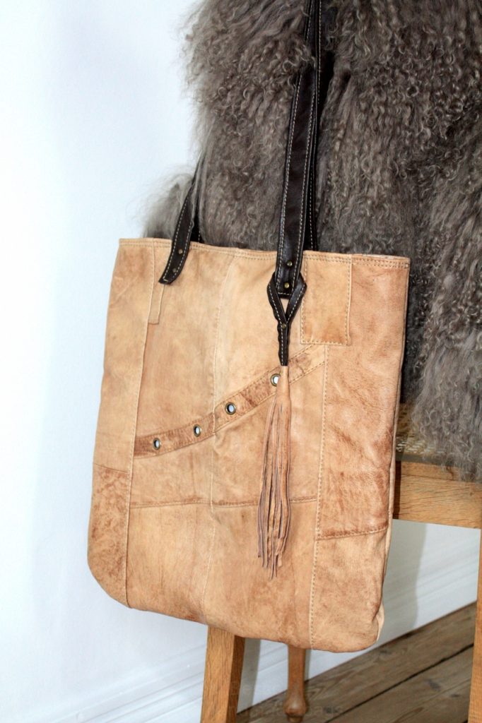 Brown, soft like a butter, acid-washed lamb leather city bag