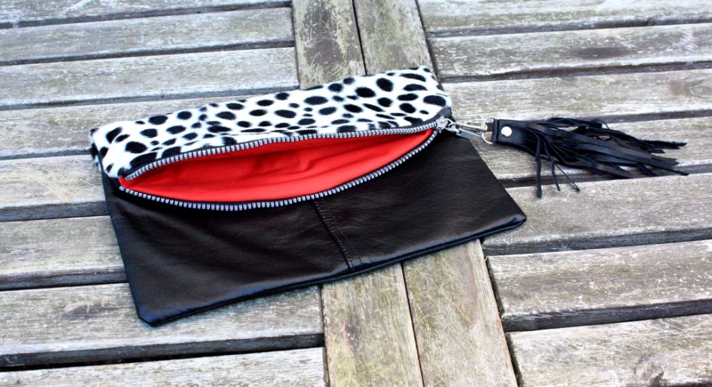Recycled leather clutch with fake fur