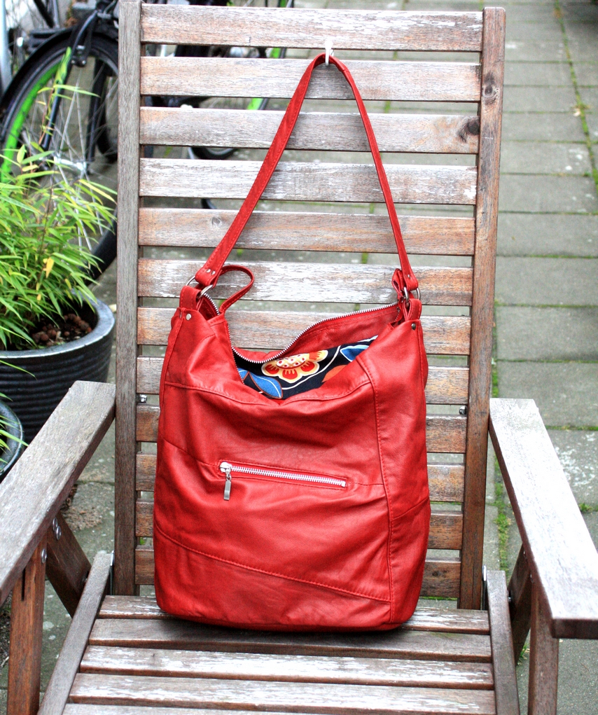 A red shoulder bag