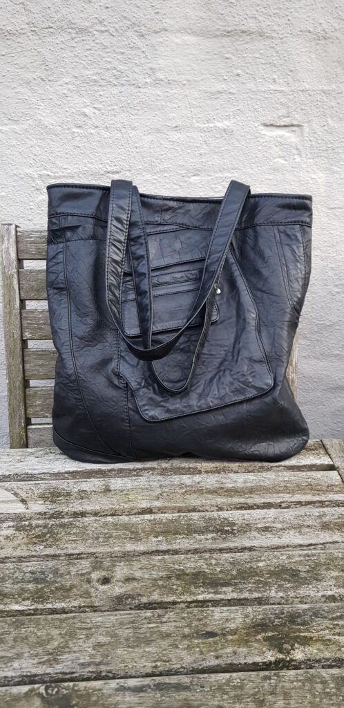 Black shopper from small trousers